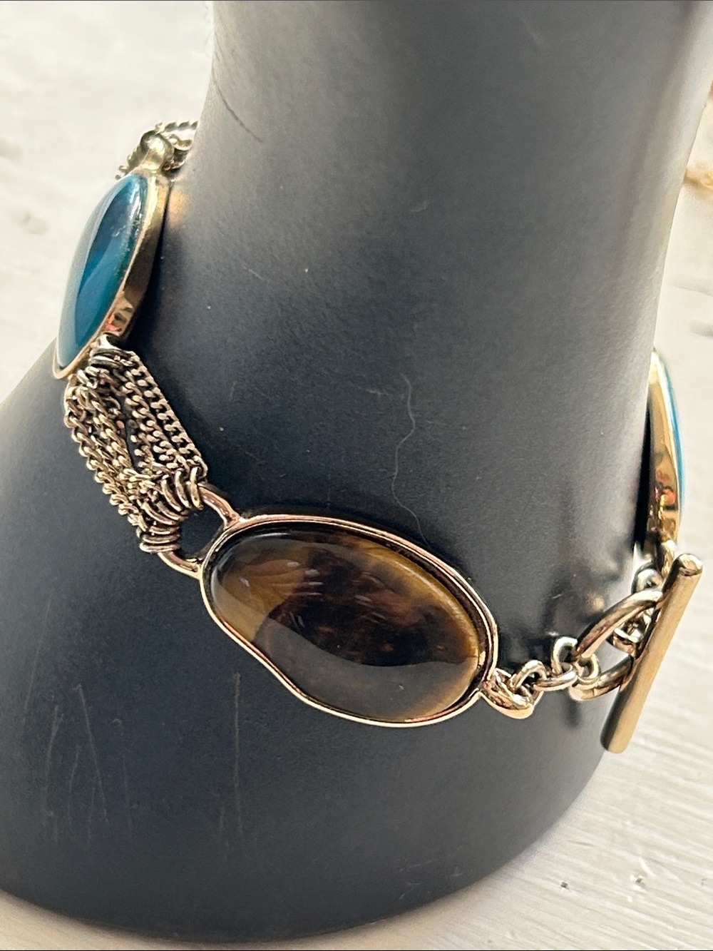 Gold tone, faux stones toggle bracelet turquoise/amber